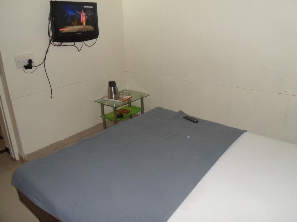 Hotel Atithi Ahmedabad Habitación foto